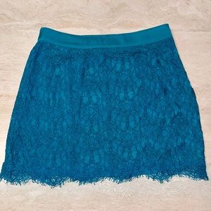 Gently worn turquoise lace skirt.